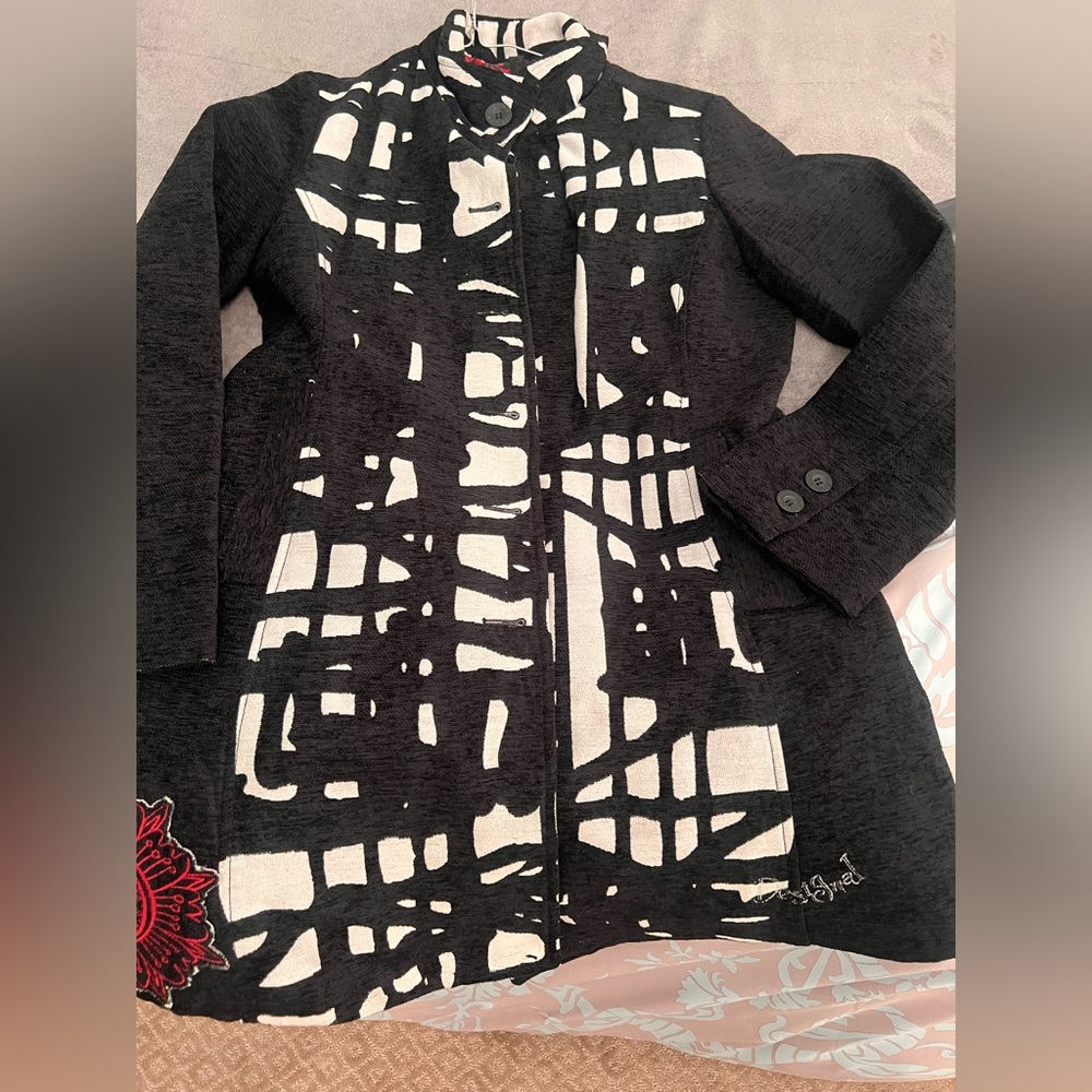 Desigual Black and white coat with red lining.